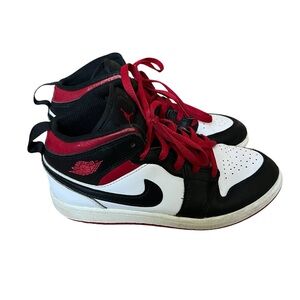 Air Jordan 1 Mid Kids Sneakers in Black, White, and Red